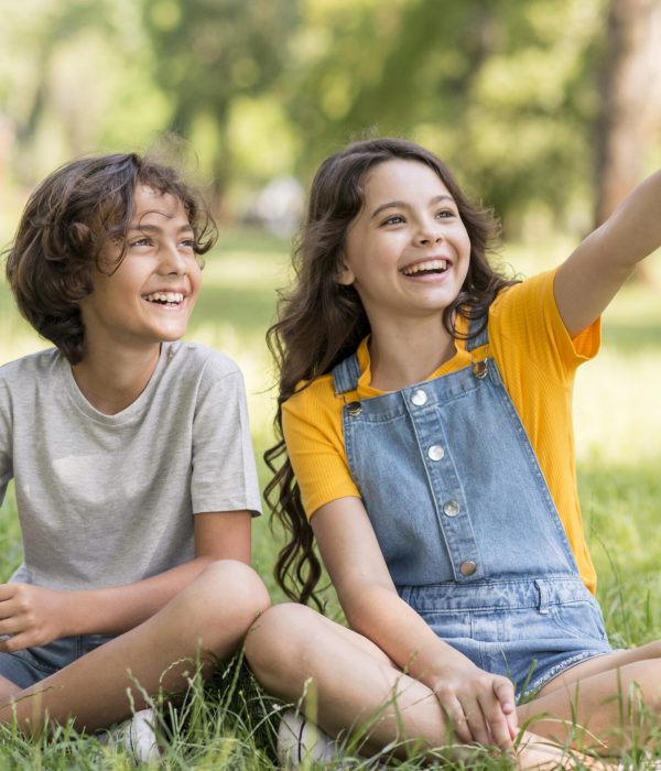 young-friends-outdoor-pointing